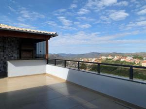 a balcony with a view of a city at Casa 161 in Diamantina