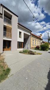 an empty parking lot in front of a building at Bytík Hlohovec Centrum in Hlohovec
