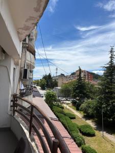 a balcony of a building with a view of a street at Apartment ANGELA Ohrid in Ohrid
