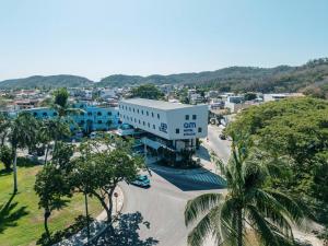 an aerial view of a building in a city at AM Hotel y Plaza in Santa Cruz Huatulco