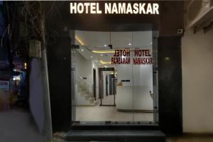 a hotel hallway with a sign that reads hotel ramazkar at Hotel Namaskar India - Just A Minute Away From New Delhi Railway Station & Connaught Place in New Delhi
