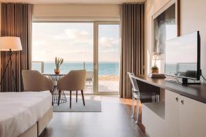 a hotel room with a view of the ocean at Hotel Flor De Sal by The Editory in Viana do Castelo