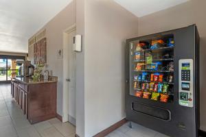a vending machine in a room with food and drinks at Red Roof Inn Gastonia in Gastonia