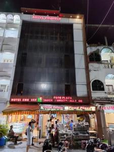 a group of people standing outside of a building at HOTEL Embassy in Rānchī