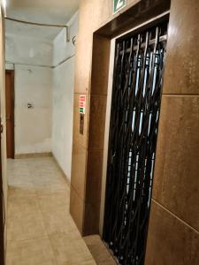 a door in a building with a sign on it at HOTEL Embassy in Rānchī