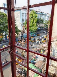 a view from a window of a busy street at JSM DELUXE Ac in Vellore