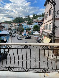 a view of a city from a balcony at Pousada Solar Central in Prados
