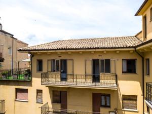 a building with balconies on the side of it at Fuori Squadra in Lanciano