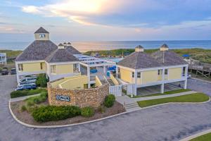 an aerial view of a house with the ocean in the background at W18- Salty Dog in Nags Head