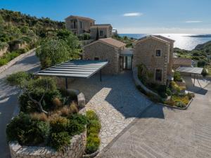 an aerial view of a house with a patio at Zeus Luxury Villas - Villa Poseidon in Kefallonia