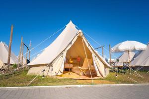 a large white tent on the side of a road at Cantinho da Floresta in Fontinha