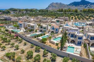 an aerial view of a villa with a resort at Villa Kalymnos by Villa Plus in Kolymbia