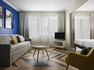 Et tv og/eller underholdning på Aparthotel Adagio Paris Porte de Versailles + 68 billeder