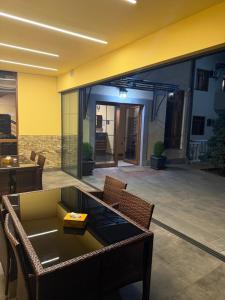 a patio with a table and chairs and a building at Capital Hotel in Yerevan