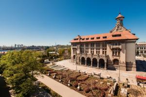an aerial view of a building with a tower at Dor de Mare - Piata Ovidiu Constanta in Constanţa