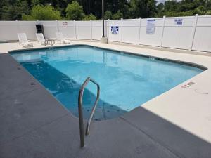 a swimming pool on top of a building at Comfort Inn & Suites Brunswick I-95 in Brunswick
