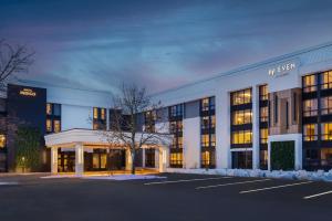 an empty parking lot in front of a building at Hotel Indigo Detroit North - Troy by IHG in Troy