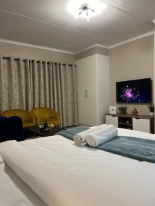 เตียงในห้องที่ Dainfern Soft Loft