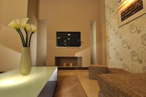 TV a/nebo společenská místnost v ubytování Hotel Fontana