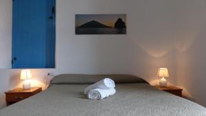 Krevet ili kreveti u jedinici u okviru objekta Il Vulcano a Piedi