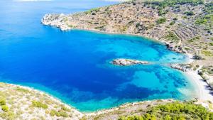 an aerial view of a beach on the amalfi coast at Lemon Tree Apartment in Chios