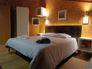 a bedroom with a large bed in a room at Casajurada in Pinhel