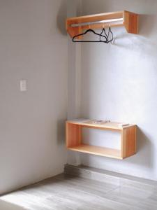 a shelf in the corner of a room at Margarita in Oaxaca City