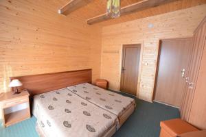 En eller flere senge i et værelse på Cottage Kurshevel + 82 billeder