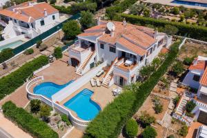 an aerial view of a house with a swimming pool at V110B Villa La Pau in Son Bou