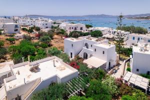 an aerial view of a town with white buildings at Guesthouse Perdikouli in Aliki