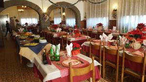 A restaurant or other place to eat at Albergo Ristorante Poli