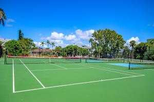 a tennis court with two tennis nets on it at Sanibel Arms West Unit A1 in Sanibel
