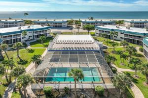 an overhead view of a building with palm trees and the ocean at Unit D2 in Sanibel