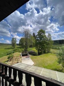 a view from the deck of a house at Apartmány Ve Mlejně in Čachrov