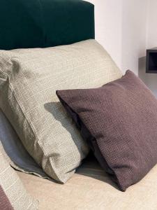 a bed with two pillows on top of it at Holiday Home Norr in Bihać +47 photos