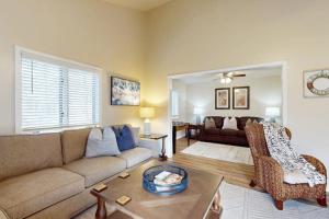 a living room with a couch and a table at Rumbling Bald Resort Unit 2004 in Lake Lure