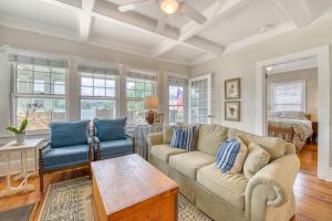 a living room with a couch and a table at Chapel Side in Lake Junaluska