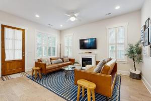 a living room with a couch and a fireplace at Downtown Delight in Brevard