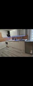 a room with a desk and a counter top with a desk at Asanov Retreat in Northeim +2 photos