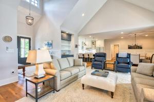 a living room with a couch and a table at Mountain Majesty in Mill Spring
