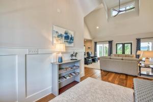 a living room with a couch and a table at Mountain Majesty in Mill Spring +38 photos