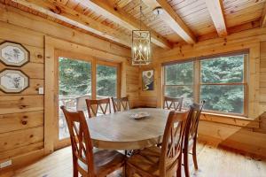 a dining room with a table and chairs at Bird's Nest in Saluda