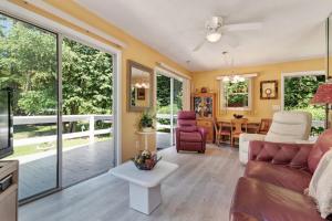 a living room with a couch and a table at 2 Bed 1 Bath Vacation home in Sylva in Sylva