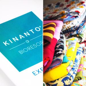 un mucchio di asciugamani su un appendiabiti con un libro di Kinanto Bioresort a Ispica
