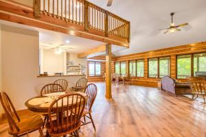 a dining room with a table and chairs at Close to Heaven in Sylva
