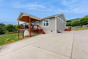a small house with a porch and a patio at Blueridge Brew View in Fairview