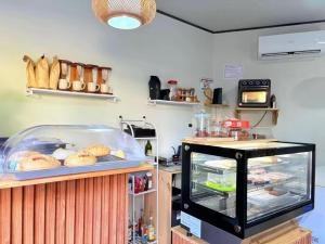 a kitchen with a counter with some food on it at Apartamentos Jireh in Quepos