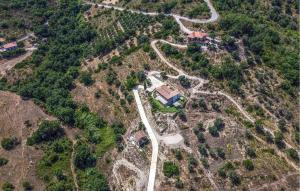 an aerial view of a house and a road at L'antica Pietra in Perdifumo