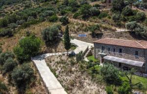 an aerial view of a house on a hill at L'antica Pietra in Perdifumo +19 photos