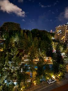 an aerial view of a city at night at Cityscape Suite in Davao City